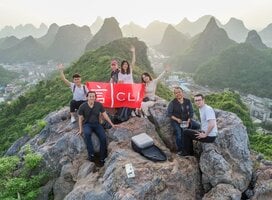 young people after a hike on top of a mountain in guilin