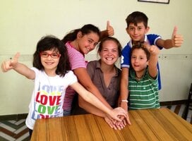 Volunteer playing with the children in Italy