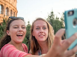 Students by the Colosseum of Rome, Italy.