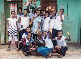 Volunteer with children in Ghana