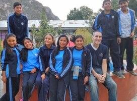 Volunteer Greg with his students