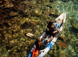 Kayaking to do snorkel survey