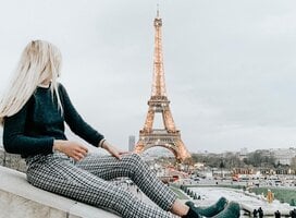Girl in foreground, with Eiffel Tower in background