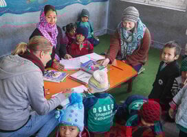 Teach eager to learn children in Nepal