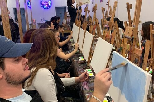 Students enjoy glow painting in Spain