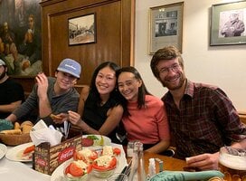 Four CET Prague study abroad students at a restaurant in Prague