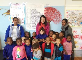 Volunteer with children in South Africa