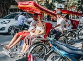 Students riding tuk tuk