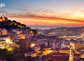 The sun sets over Lisbon.